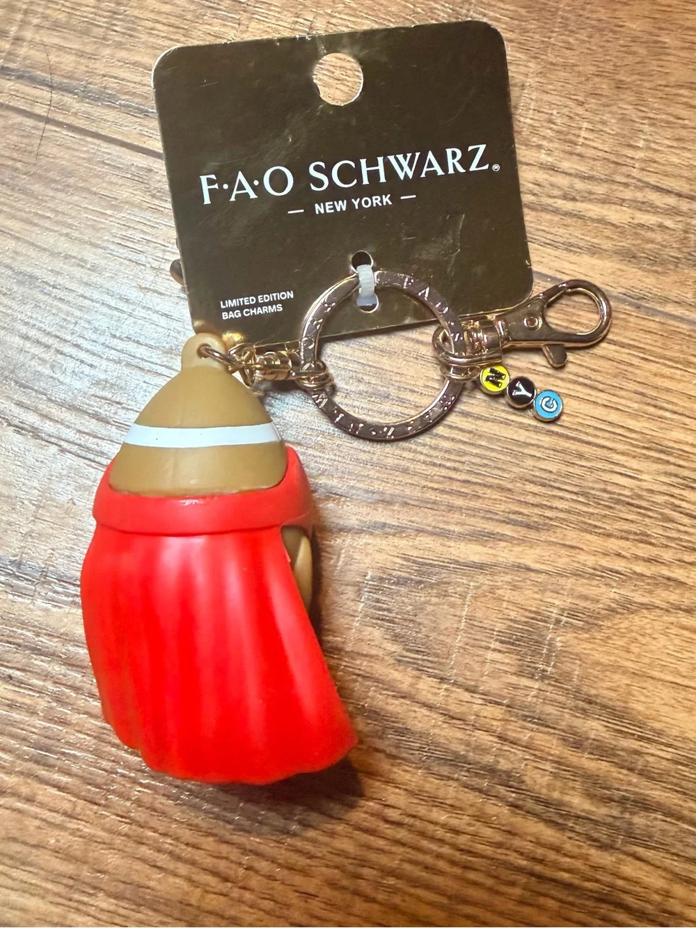 FAO Schwarz Red & Brown Superhero Football Bag Charm Keychain